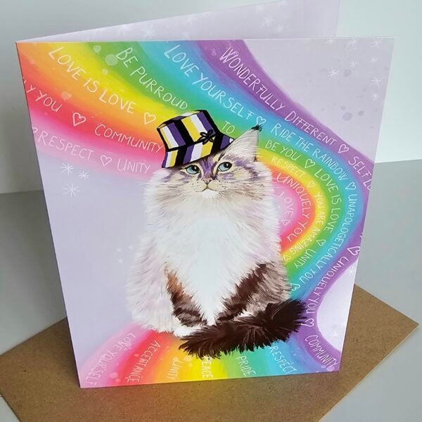 Cute LGBTQ love is love greeting card featuring a fluffy ragdoll cat sitting on a rainbow wearing a bucket hat with non binary colours.