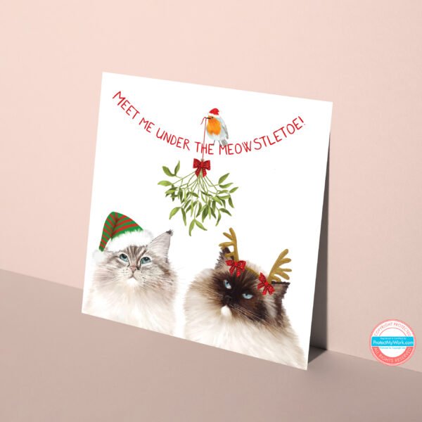 Ragdoll cat christmas card featuring two cute kitties under the mistletoe.