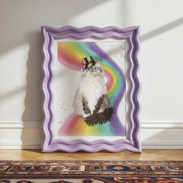 Framed print of a cute ragdoll cat wearing a non binary hat while sitting on the rainbow.