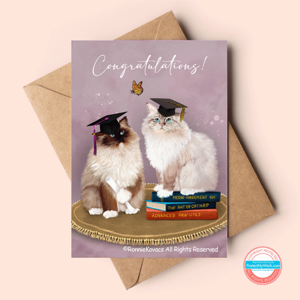 Ragdoll cat graduation greeting card showing two fluffy cats wearing graduation caps.