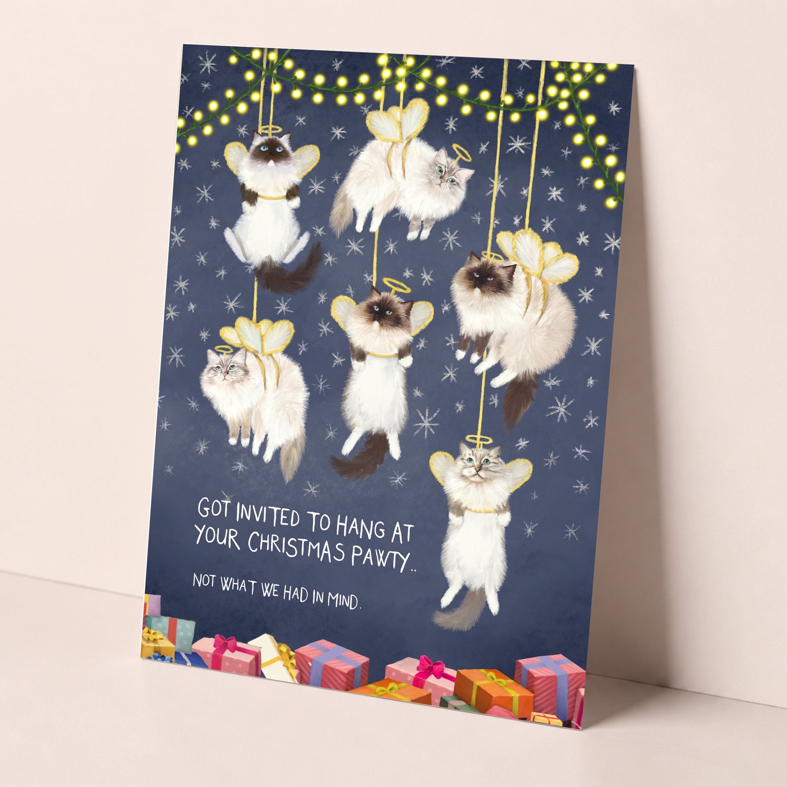 Funny ragdoll cat christmas card featuring 6 fluffy cats dressed as angel decorations.